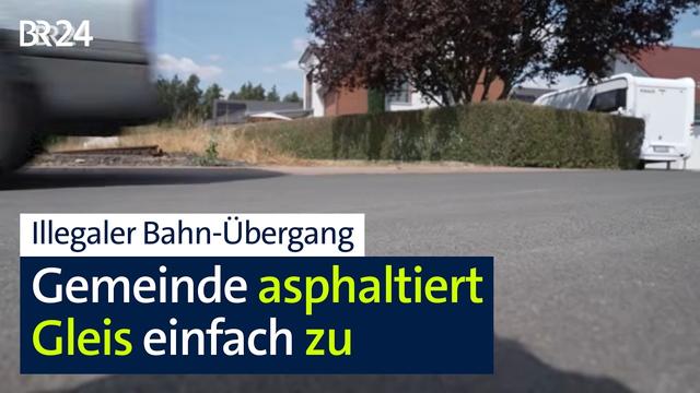 "Da kann kein Zug mehr fahren": Illegaler Bahn-Übergang spaltet Kommune | BR24