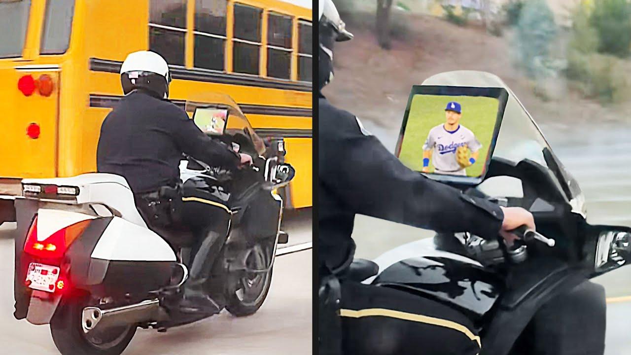 Cop Watches TV While Driving